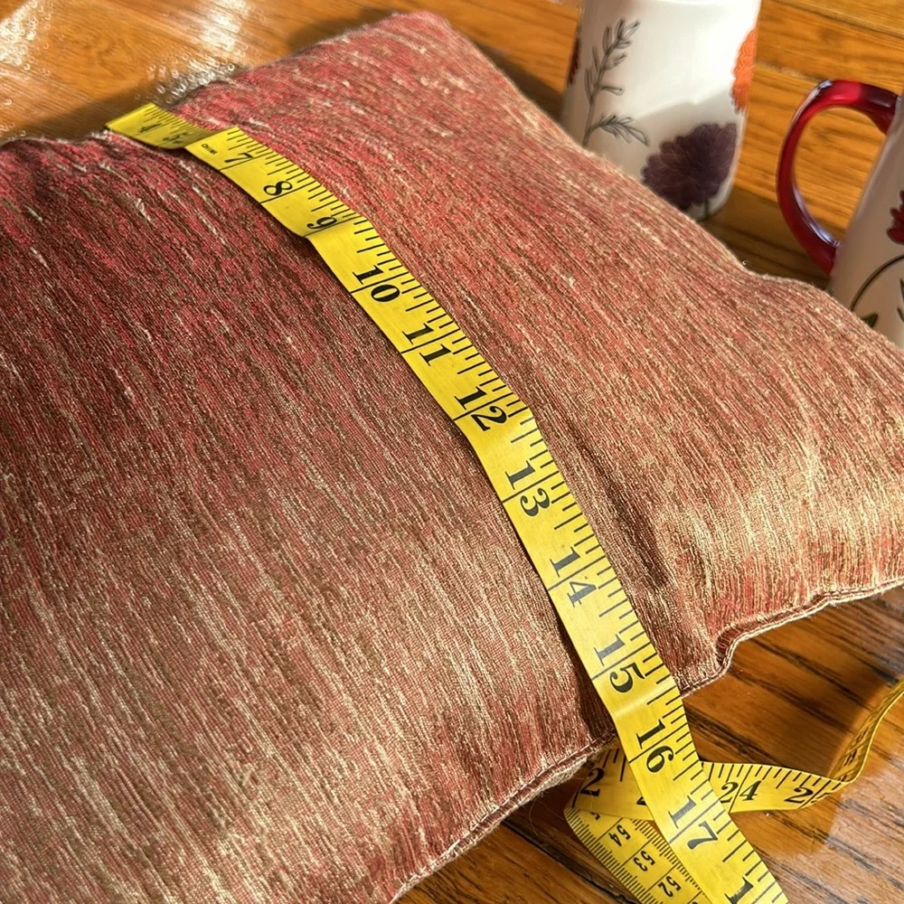 Unbranded braided cord accent pillow. Approximately 16” square.